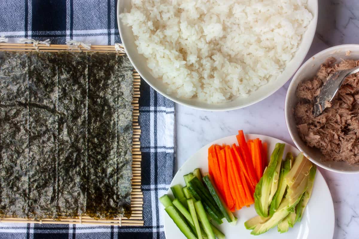 All the prepped sushi ingredients laid out ready to use.